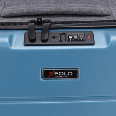 מזוודת טרולי 20" מתקפלת עליה למטוס דגם XFOLD מבית Swiss Voyager בצבע ג'ינס