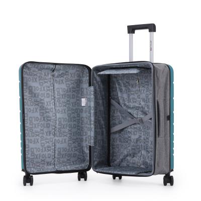 מזוודת טרולי 20" מתקפלת עליה למטוס דגם XFOLD מבית Swiss Voyager בצבע ירוק בקבוק