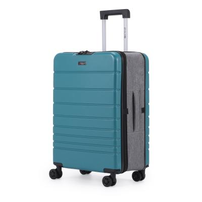 מזוודת טרולי 20" מתקפלת עליה למטוס דגם XFOLD מבית Swiss Voyager בצבע ירוק בקבוק